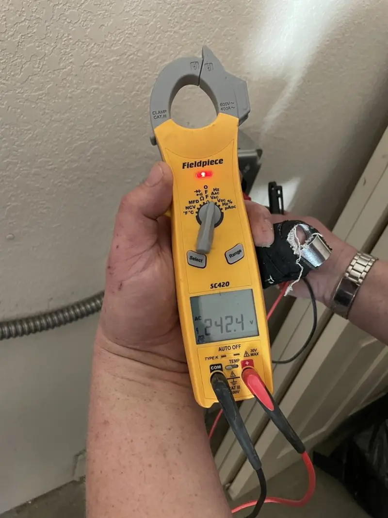 Voltage testing with clamp meter during Outlet Installation in Luverne